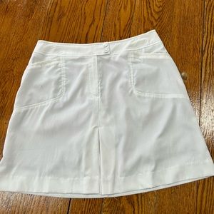 Y2K Tail white tennis skirt.  Micro mini.  Flesh color short attached. Size 8